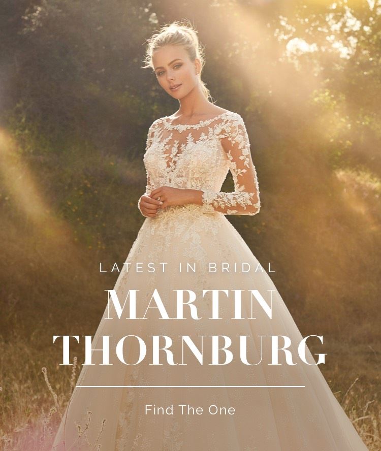 Banner for Martin Thornburg collection. Model wearing long sleeve floral and lace wedding dress on mobile device