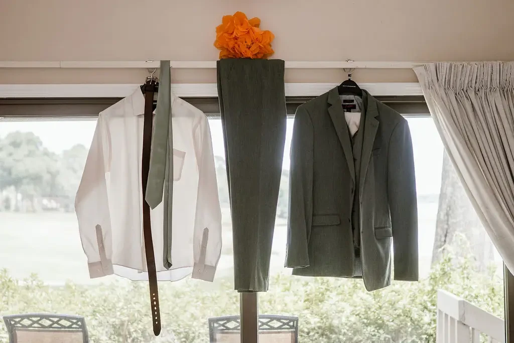 groom suit hanging