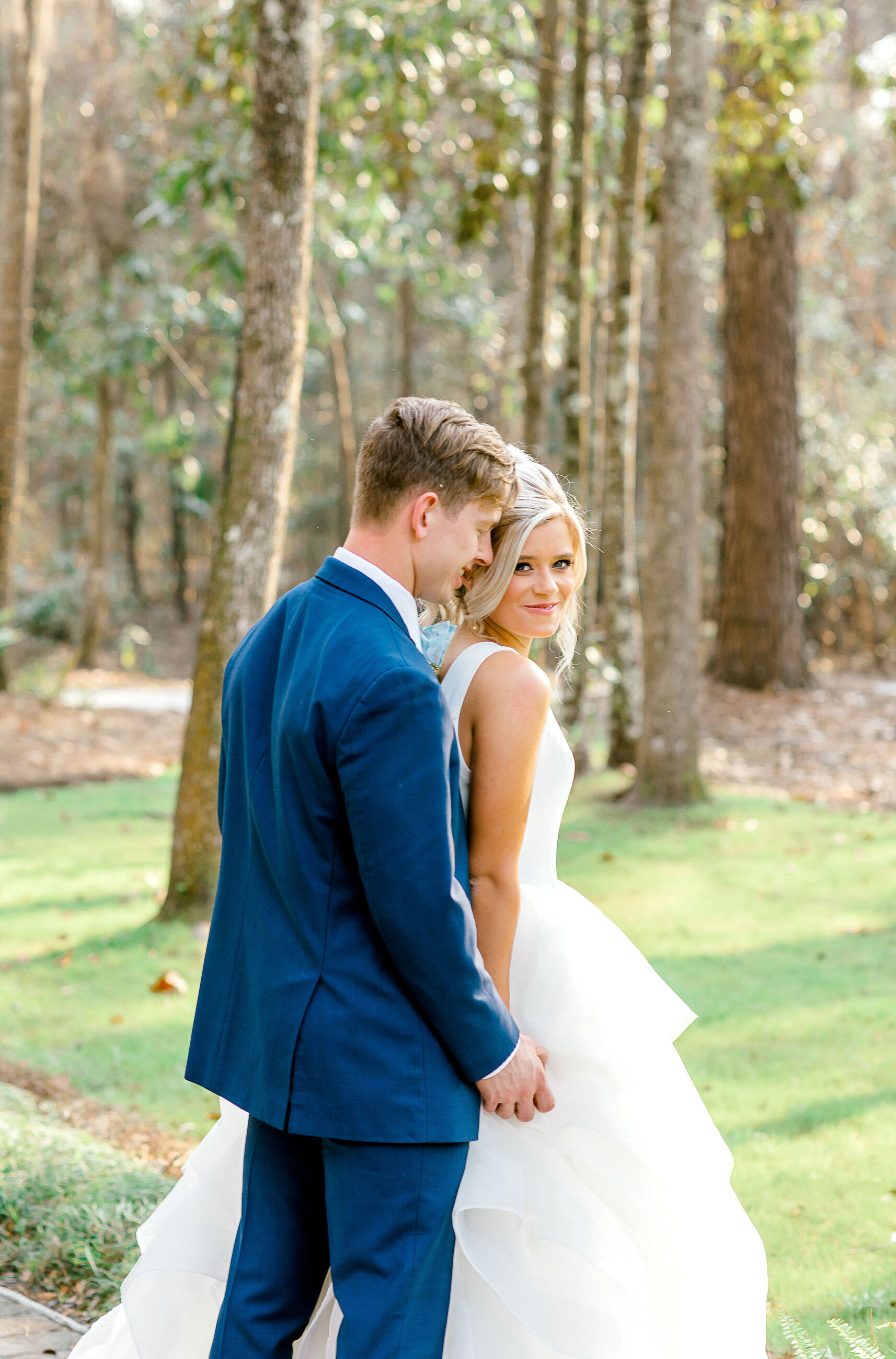 groom looking at bride