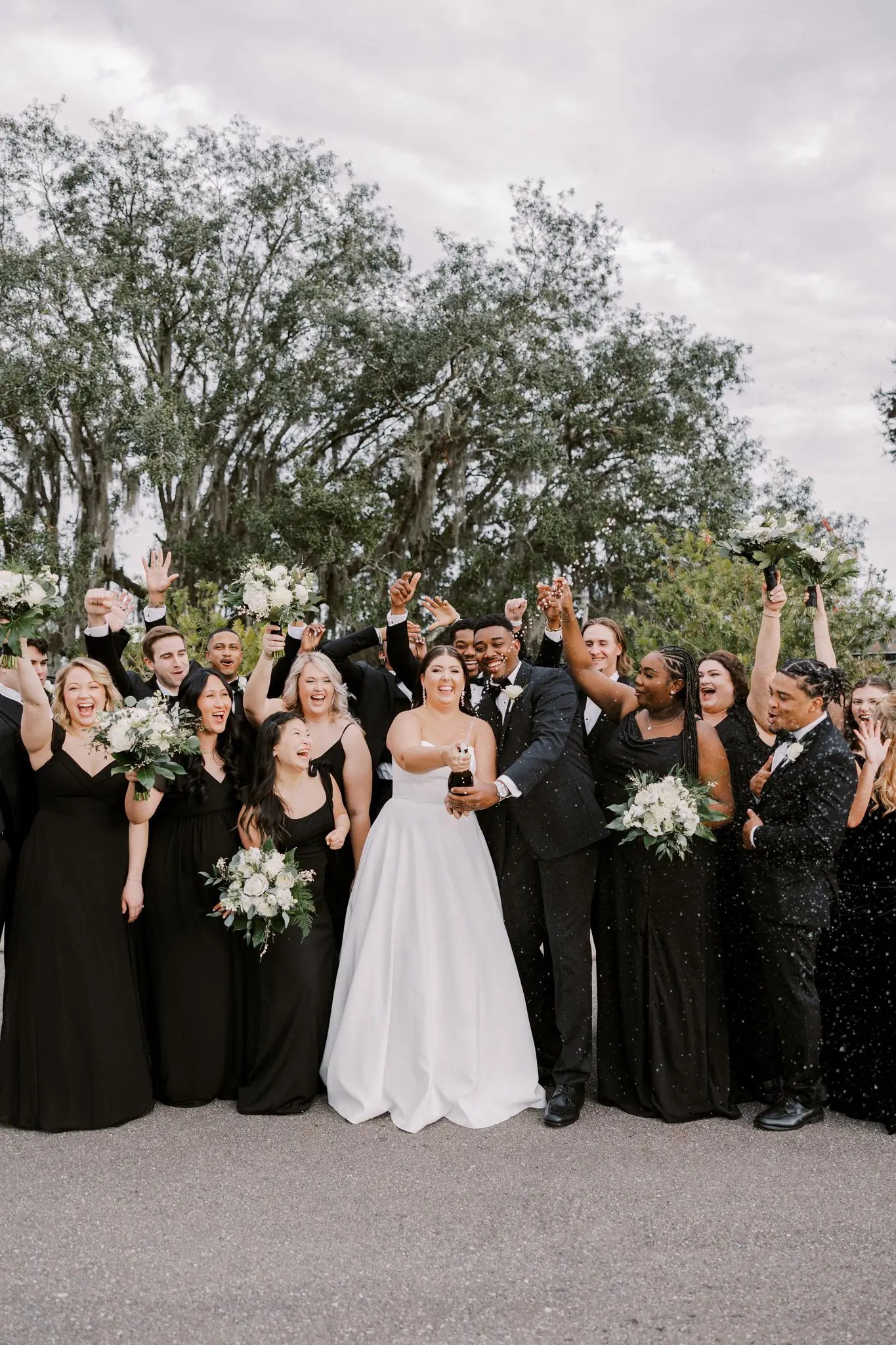 Entire bridal party celebrating 